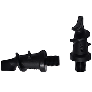 a set of screw point auger tips. One upright, one sideways